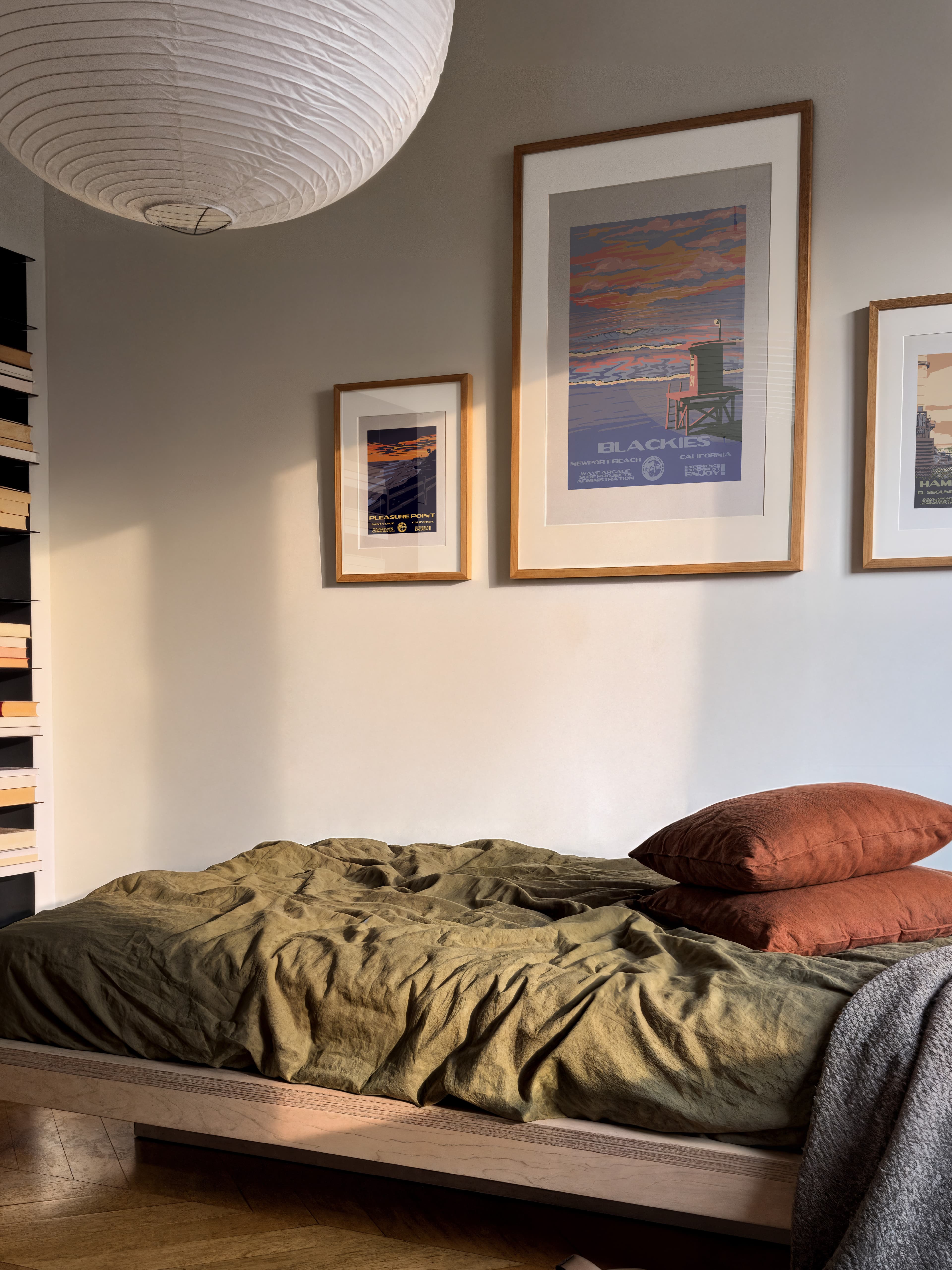 Framed Wave Arcade print in a bedroom