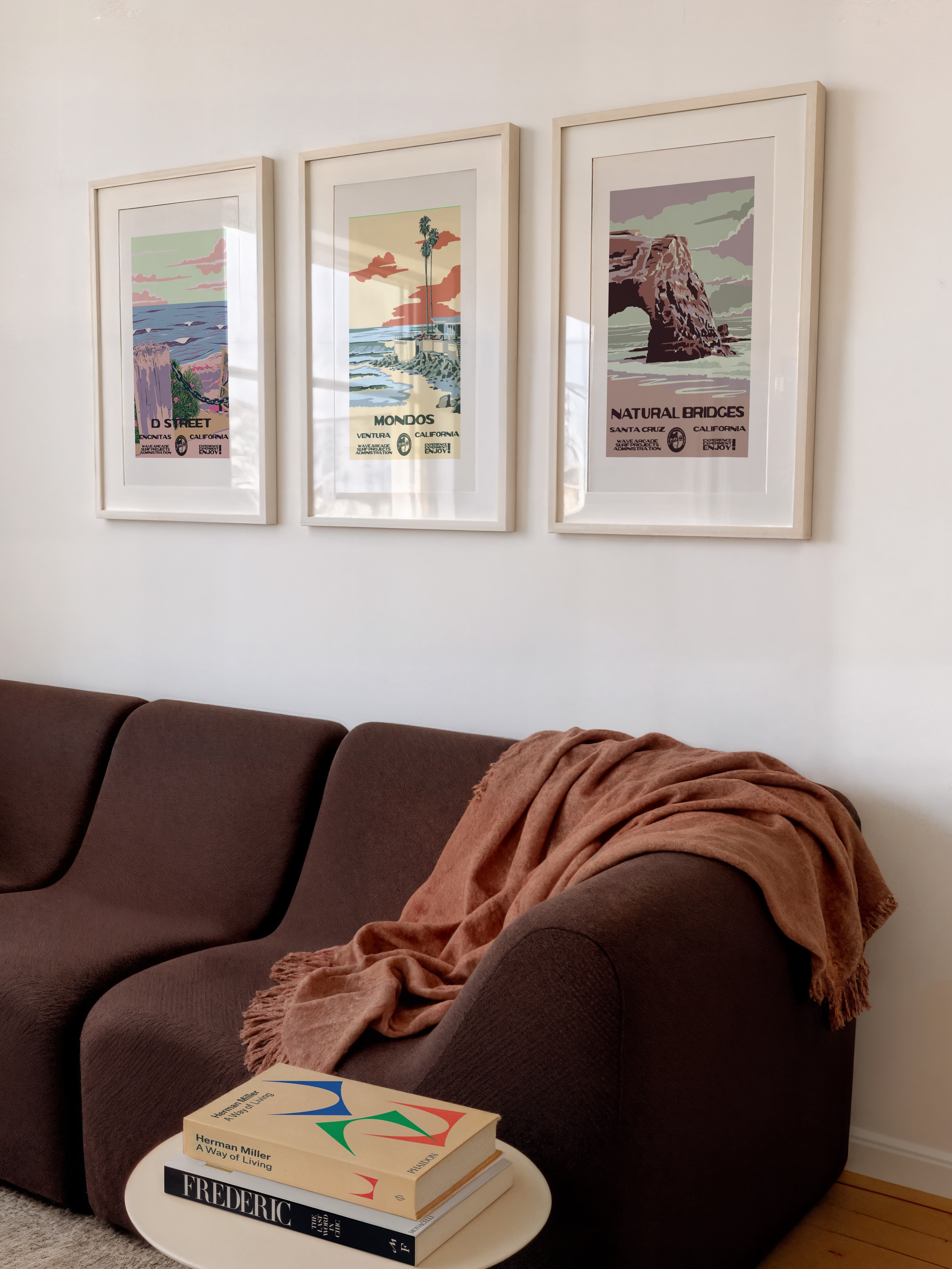 Wave Arcade prints over a couch